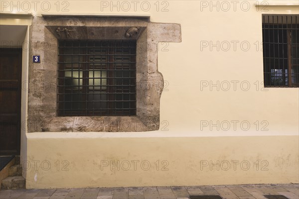 Building Exterior with Iron Bars on Window