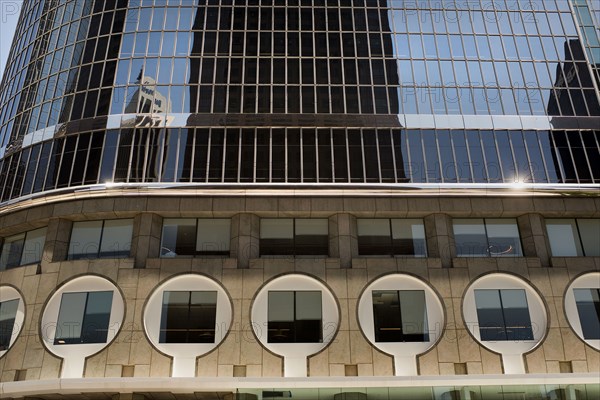 Keyhole windows at base of Modern Office Building