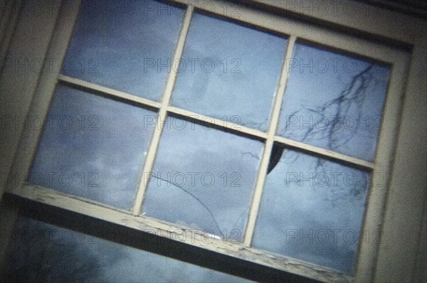 Broken Window on Old Garage