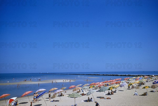 Beachgoers and Sun Umbrellas