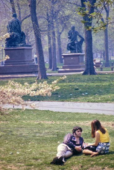 Couple relaxing on Lawn