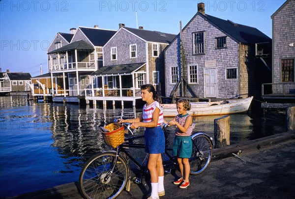 Two Young Girls with Tandem Bicycle