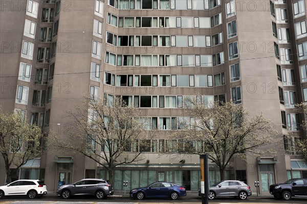 Cars Parked in front of Residential Building