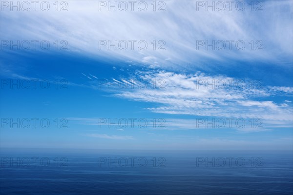 Clouds and blue sky over the Pacific Ocean