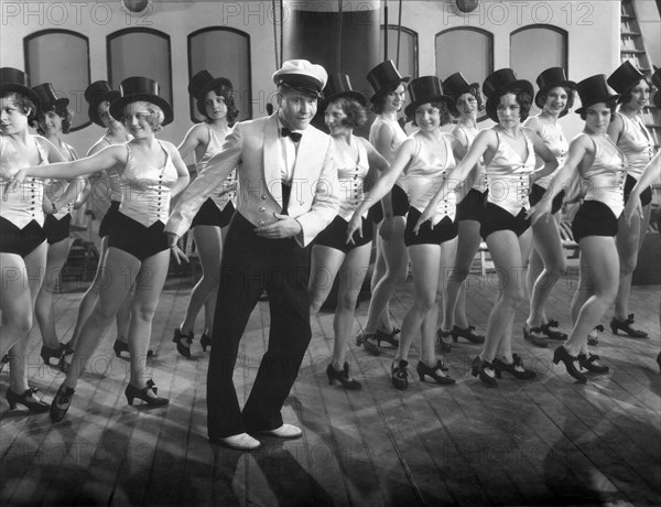Jackie Oakie with Rows of Chorus Girls