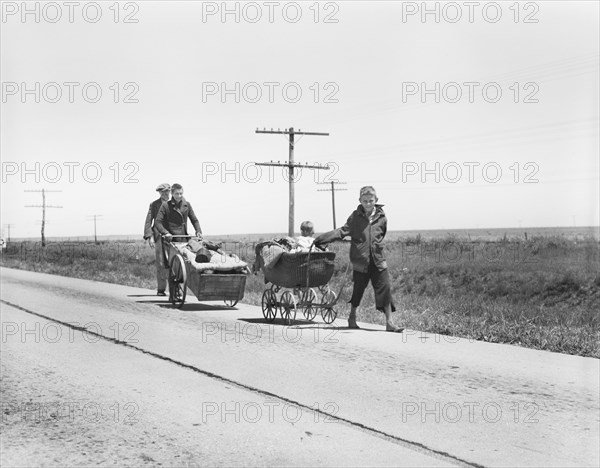 Flood refugees walking along Road four miles out of Memphis