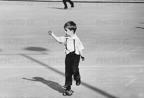 Young Boy on Roller skates in Park