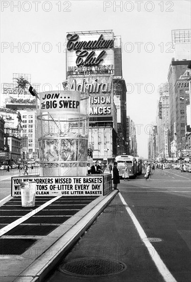 Large Trash Can with sign that reads "Join the Big Sweep" Times Square