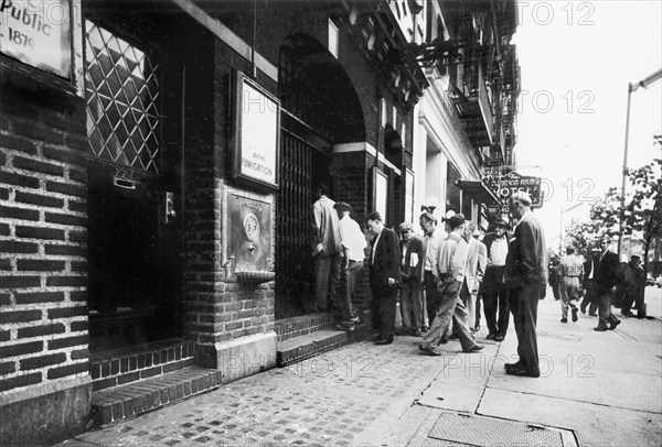 Men lined up outside Bowery Mission and Salvation Army Hotel
