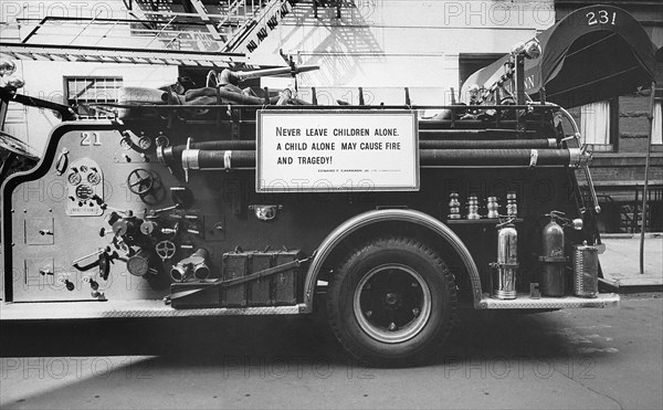 Side View of Fire Truck with Sign