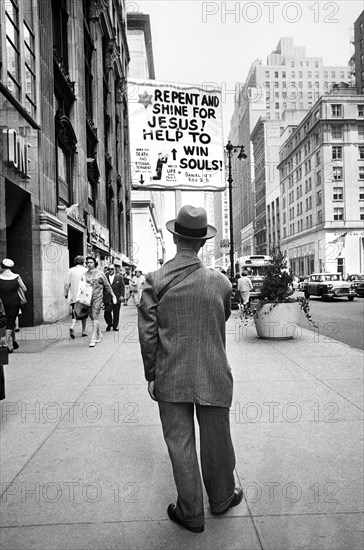 Rear View Portrait of Man on Sidewalk