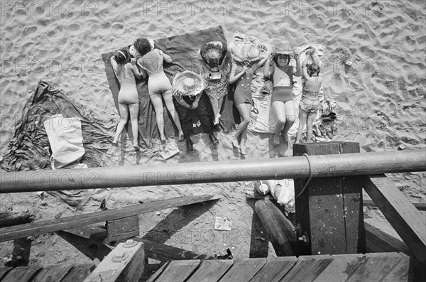 High Angle View of Sunbathers at Beach