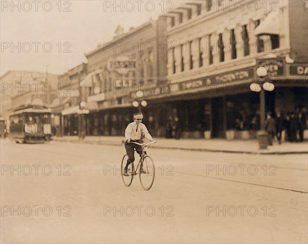 Messenger Boy on Bicycle