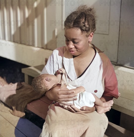 Mother with First Baby born in Okeechobee Migratory Labor Camp