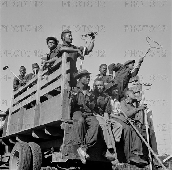 Students waiting to be taken to the agricultural school farm