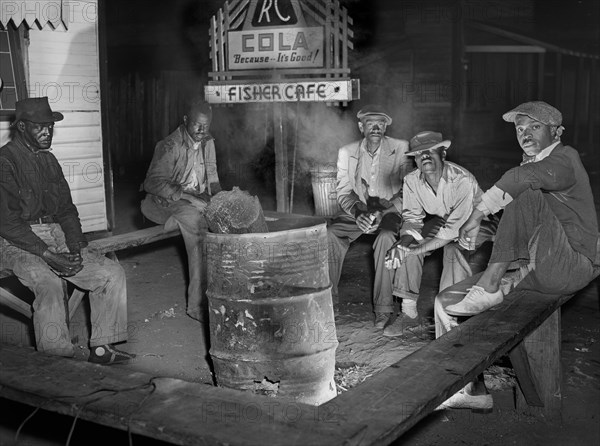 Laborers sitting around Fire on Saturday Night