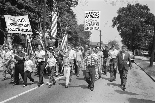 Crowd marching from Arkansas State Capitol to Central High School to protest integration of Central High School