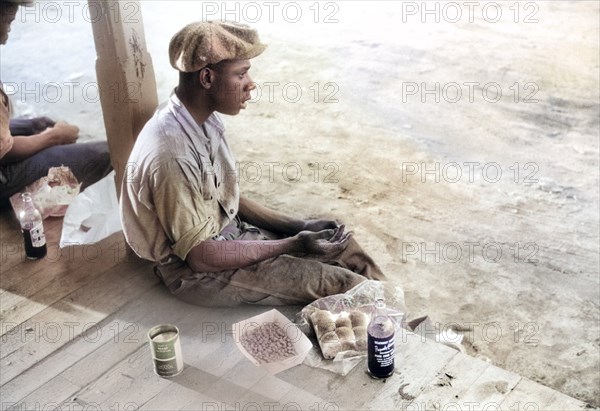 Florida Migrant having Supper consisting of cold baked beans