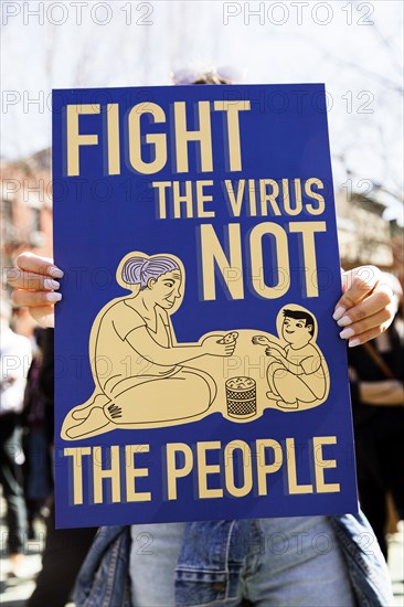 Fight the virus not the people Sign at Anti-Asian Violence Rally