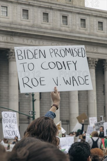 Biden promised to codify roe v. wade Sign at Abortion Rights Rally