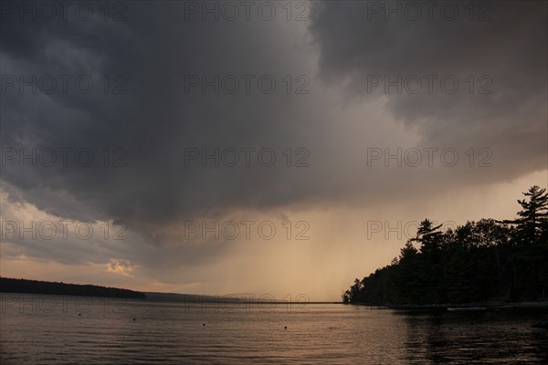 Storm clouds at lake