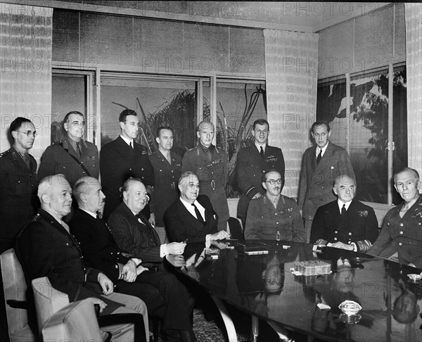 British Prime Minister Winston Churchill (seated third from left)