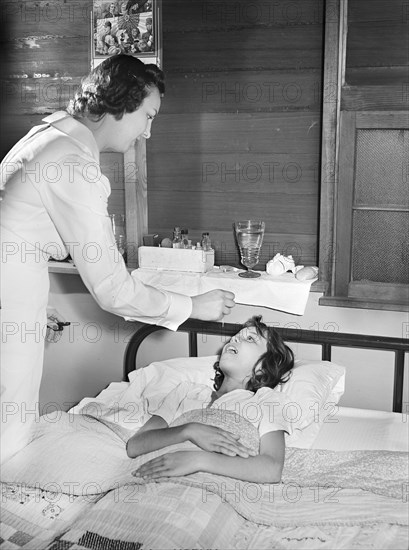 Patient receiving medical aid in health clinic