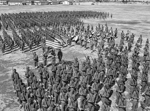 Soldiers of 41st Engineers in formation on Parade Ground with Sergeant Franklin Williams in color guard