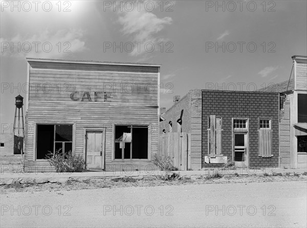 Stores in town abandoned because of continued crop failures. Keota