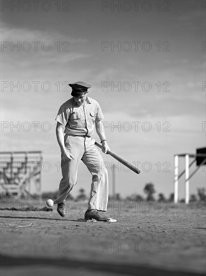 Man playing baseball