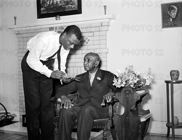 Dr. George Washington Carver talking to member of Reserve Officers Training Corps