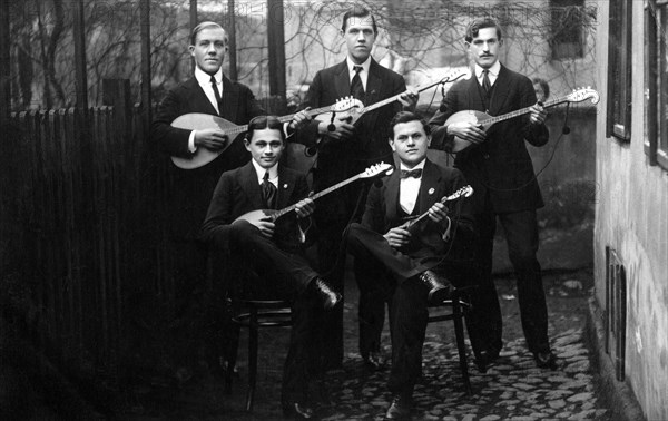 Group of Men playing Mandolins