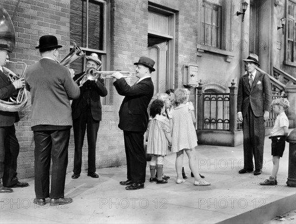 Noel Coward (far right)