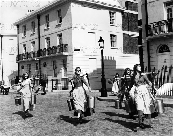 Milkmaids during "Who Will Buy" musical number