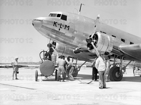 KLM Airplane being serviced t airport