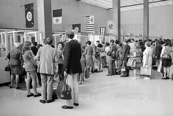 New arrival of visitors lining up at customs checkpoint