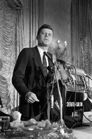 U.S. Senator John F. Kennedy speaking at luncheon  where he delivered speech supporting assistance to African nations