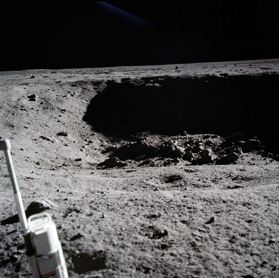 Moon crater photographed by Apollo 11 crew near landing site during their lunar surface extravehicular activity