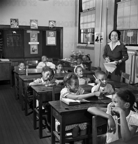 Teacher with students in elementary school class, Washington, D.C., USA, Marjory Collins, U.S. Office of War Information, March 1942