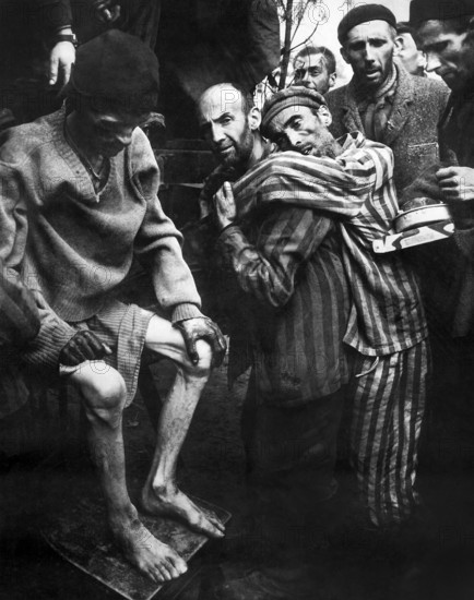 Prisoners from Wobbelin concentration camp, being taken to hospital for medical attention after capture by troops U.S. 82nd Airborne Division, Wobbelin, Germany, U.S. Army Signal Corps, May 4, 1945