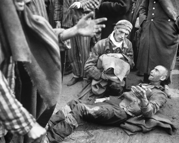 Prisoners from Wobbelin concentration camp found by U.S. Ninth Army Division, waiting to taken to hospital for medical attention, Wobbelin, Germany, U.S. Army Signal Corps, May 4, 1945