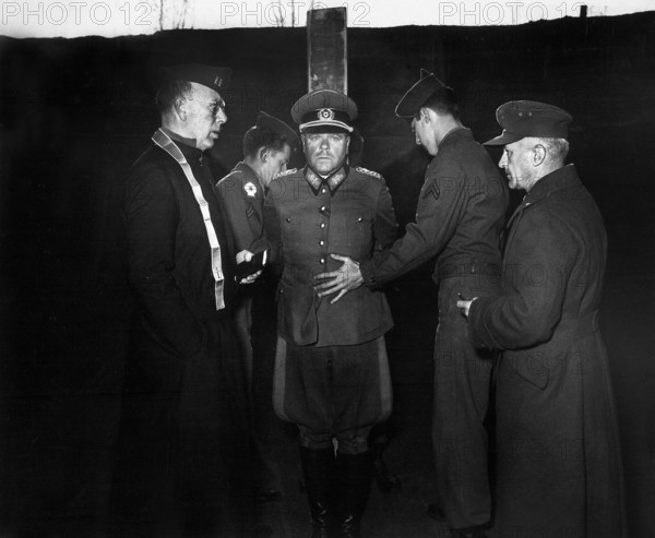 German General Anton Dostler, convicted and sentenced to death by an American military tribunal, is tied to take before his execution by firing squad Aversa, Italy, U.S. Army Signal Corps, December 1, 1945