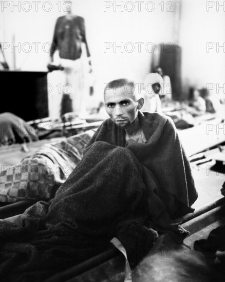 Starved inmate of Camp Gusen, Austria, U.S. Army Signal Corps, May 12, 1945