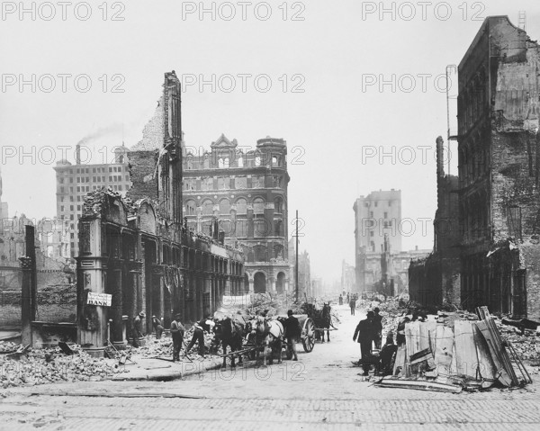 Damaged buildings after earthquake, looking north from junction of Sansome and Bush Streets, also known as insurance district, San Francisco, California, USA, U.S. Army Signal Corps, April 1906