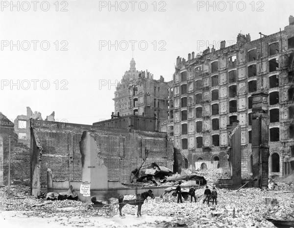 Damaged buildings at junction of Mission and New Montgomery Streets after earthquake, Palace Hotel on extreme right, San Francisco, California, USA, U.S. Army Signal Corps, April 1906