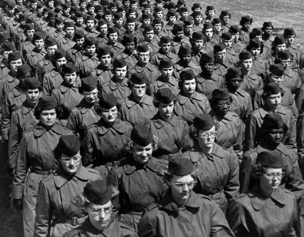 Group of female basic trainees marching in company formation at WAC training Center, Fort McClellan, Alabama, USA, U.S. Army Signal Corps, 1968