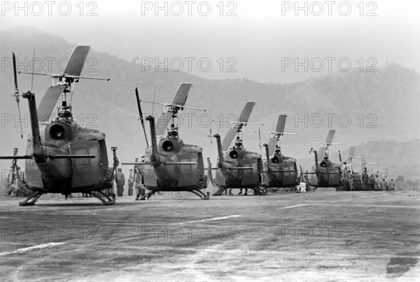U.S. helicopters of 170th and 189th Helicopter Assault Companies, awaiting the leading of troops at Polei Kleng, Central Highlands of Republic of South Vietnam, U.S. Army Signal Corps, April 10, 1969