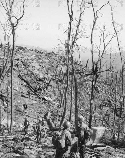 Members of U.S. 1st ARVN Division move along trail during assault operation near Fire Support Base O'Reilly, Vietnam, U.S. Army Signal Corps, October 8, 1970