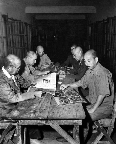 Six high-ranking Japanese generals and admirals, Lt. Gen. Shinpel Fukuei, Maj. Gen. Takeo Manjome, Rear-Adm. Kaku Harada, Maj. Gen. Tadasn Kataoka, Maj. Gen. Isamu Hirai and Maj. Gen. Masuo Yoshiki, who surrendered at Cebu, Philippines, pictured shortly after their incarceration in New Bilibid prison, near Manila, Philippines, U.S. Army Signal Corps, September 3, 1945