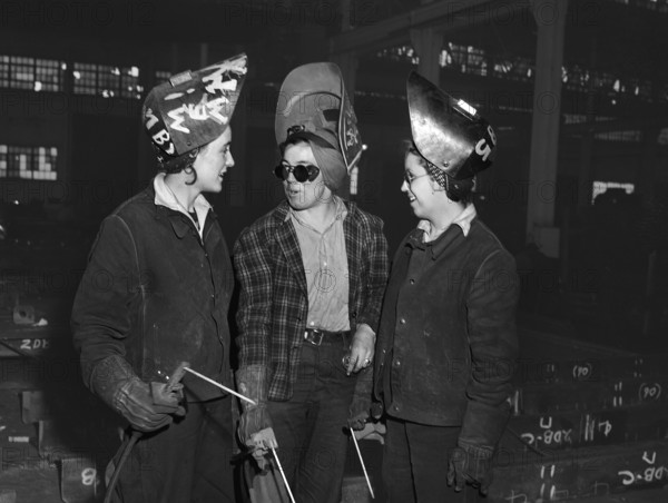 Three female welders in fabricating shop, Bethlehem-Fairfield shipyards, Baltimore, Maryland, USA, Arthur S. Siegel, U.S. Office of War Information, May 1943